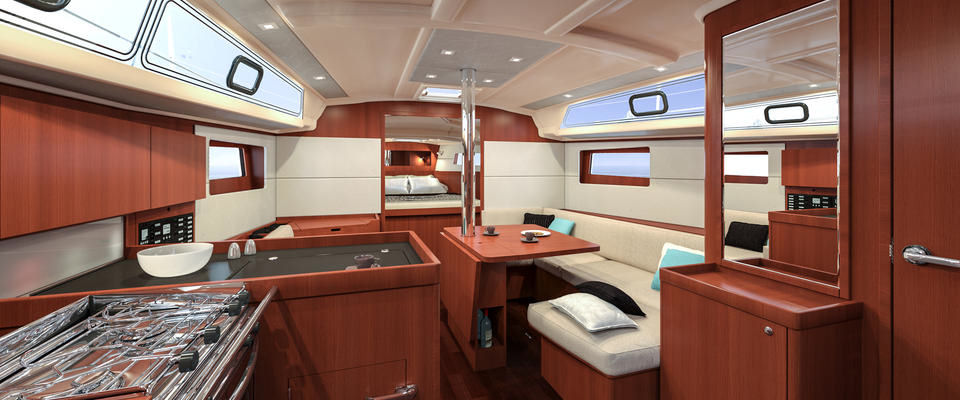 The L-shaped galley to port. Notice the abundance of windows, both in the hull and cabin top, allowing an abundance of natural light to enter the salon.