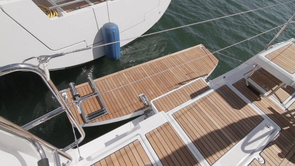 The Oceanis 41.1 with her transom converted into the swim platform. Note the handy step from the deck to the swim platform. Not shown is the swim ladder deployed.